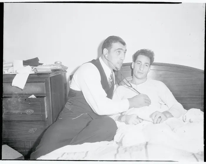 Framed Print : Primo Carnera Holding Stethoscope to Art Lasky Framed Print : Primo Carnera Holding Stethoscope to Art Lasky