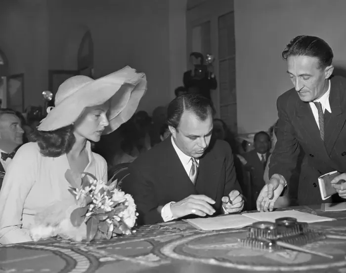 Framed Print : Prince Aly Khan Signing Official Register Framed Print : Prince Aly Khan Signing Official Register