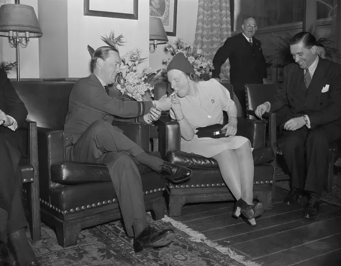 Framed Print : Prince Bernhard Lighting Cigarette for Princess Juliana Framed Print : Prince Bernhard Lighting Cigarette for Princess Juliana