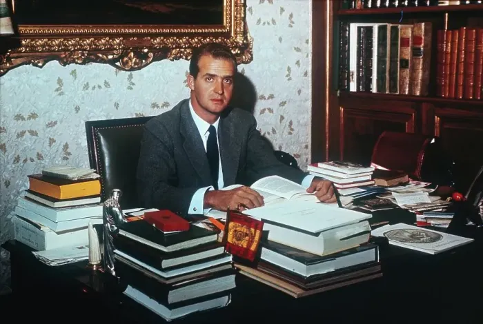 Framed Print : Prince Juan Carlos Reading at Desk Framed Print : Prince Juan Carlos Reading at Desk