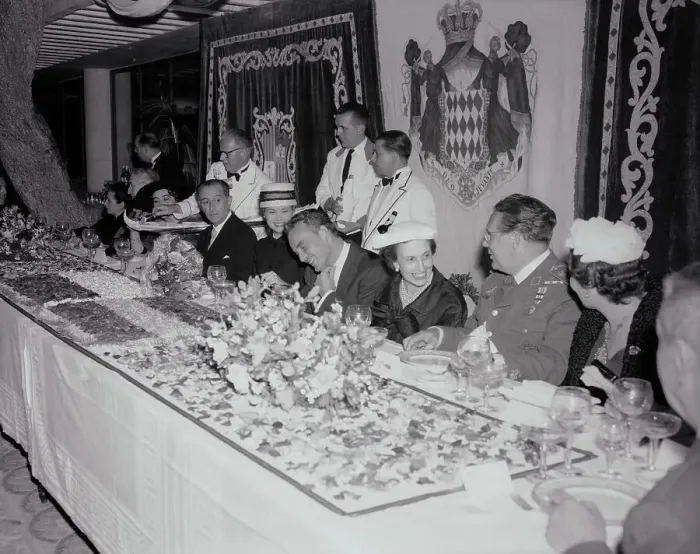 Framed Print : Prince Rainier and Grace Kelly Sitting With Colleagues Framed Print : Prince Rainier and Grace Kelly Sitting With Colleagues