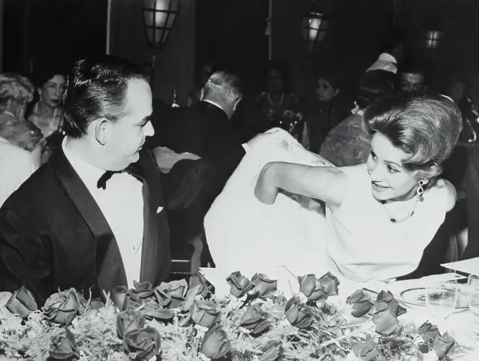 Framed Print : Prince Rainier III Helping Athina Onassis Remove Her Coat Framed Print : Prince Rainier III Helping Athina Onassis Remove Her Coat