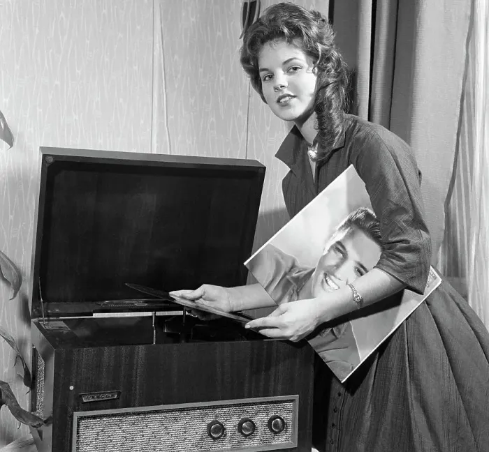 Framed Print : Priscilla Beaulieu Playing an Elvis Presley Record Framed Print : Priscilla Beaulieu Playing an Elvis Presley Record