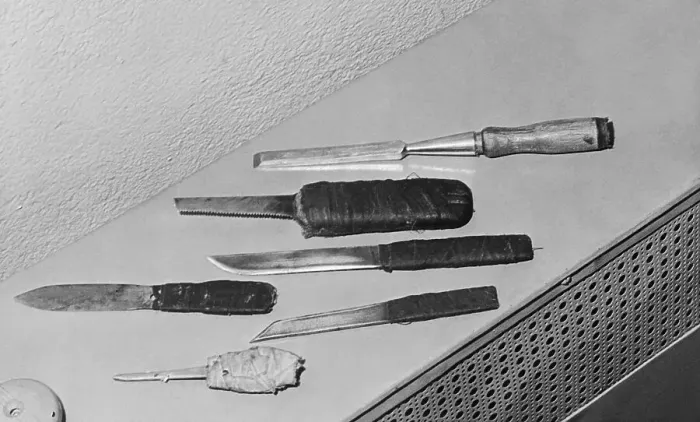 Framed Print : Prisoner's Knives Laid Out on Table Framed Print : Prisoner's Knives Laid Out on Table