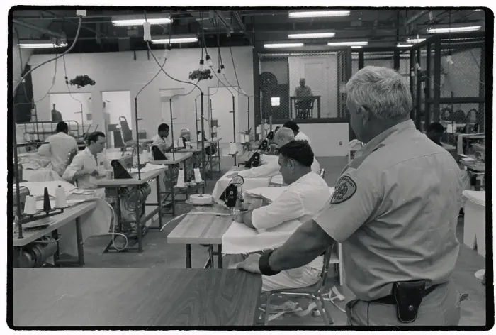 Framed Print : Prisoners Sewing in Workshop