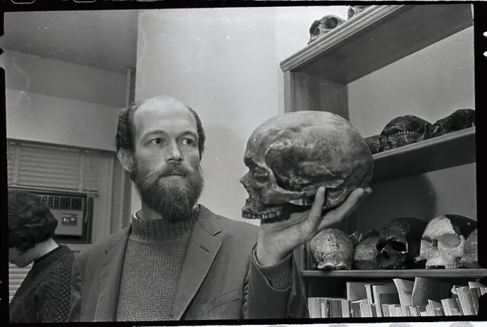 Framed Print : Professor Holding Skull Framed Print : Professor Holding Skull