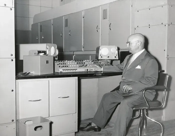 Framed Print : Professor Picone at Computerized Control Panel