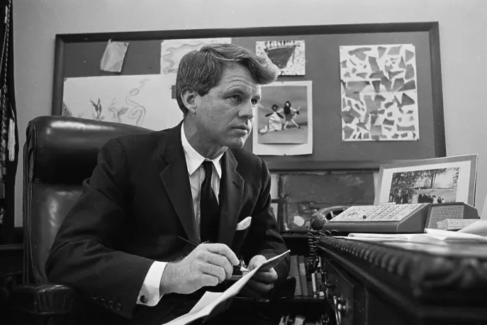 Framed Print : Profile of Robert Francis Kennedy Pausing from Writing at His Desk