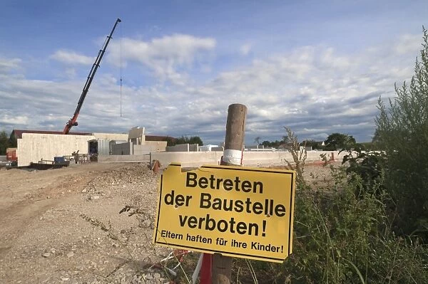 Prohibition sign keep off construction site, construction of a modern cow shed, Bavaria, Germany
