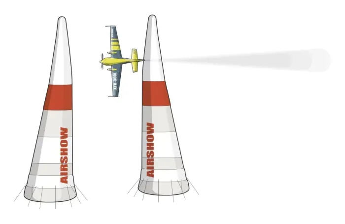 Framed Print : Propeller plane in mid air, and two pylons in foreground Framed Print : Propeller plane in mid air, and two pylons in foreground