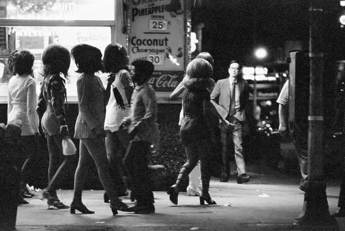 Framed Print : Prostitutes Walking on a Sidewalk at Night Framed Print : Prostitutes Walking on a Sidewalk at Night