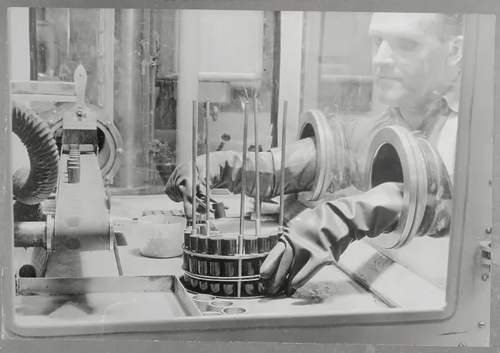 Framed Print : Protected Technician Working with Uranium