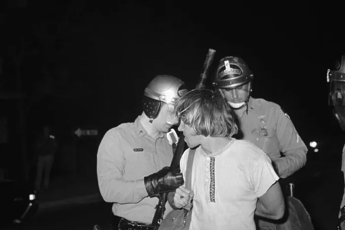 Framed Print : Protester Being Arrested
