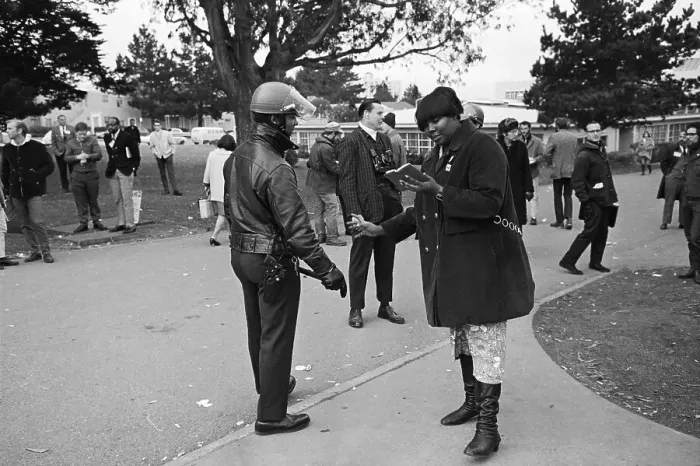 Framed Print : Protester Reads Mao Tse-Tung to Police Framed Print : Protester Reads Mao Tse-Tung to Police