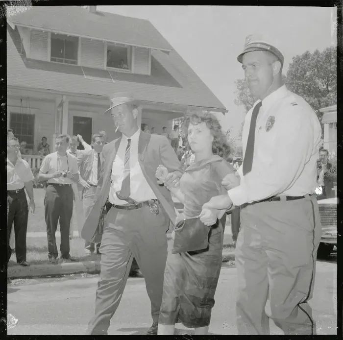 Framed Print : Protester Being Taken into Custody Framed Print : Protester Being Taken into Custody