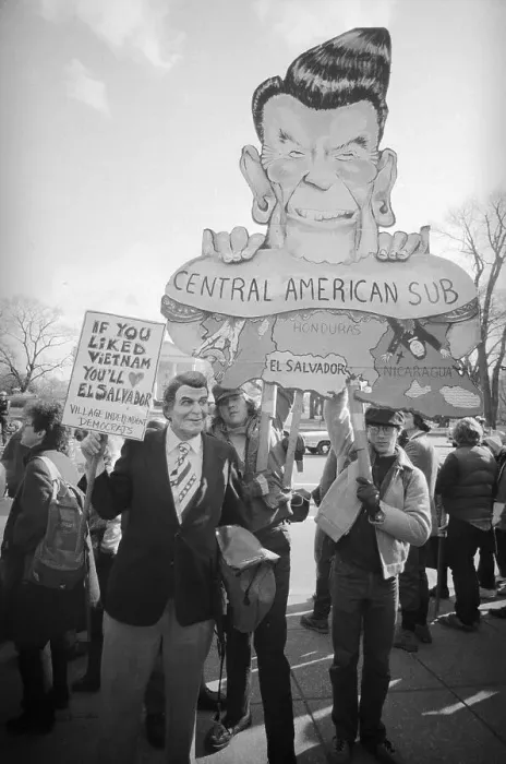 Framed Print : Protester Wearing President Reagan Mask