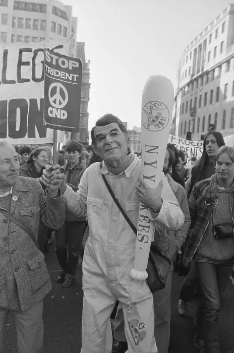 Framed Print : Protester Wearing Reagan Mask Framed Print : Protester Wearing Reagan Mask