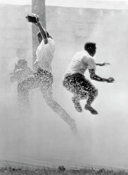 Framed Print : Protesters Sprayed with Fire Hose Framed Print : Protesters Sprayed with Fire Hose