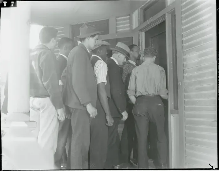 Framed Print : Protesting Unemployed Men Entering Abandoned House