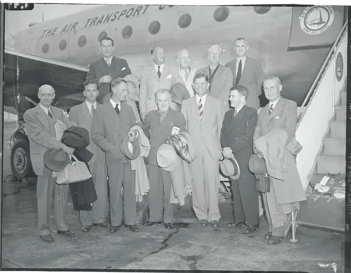 Framed Print : Publishers and Editors Posing near Airplane Framed Print : Publishers and Editors Posing near Airplane