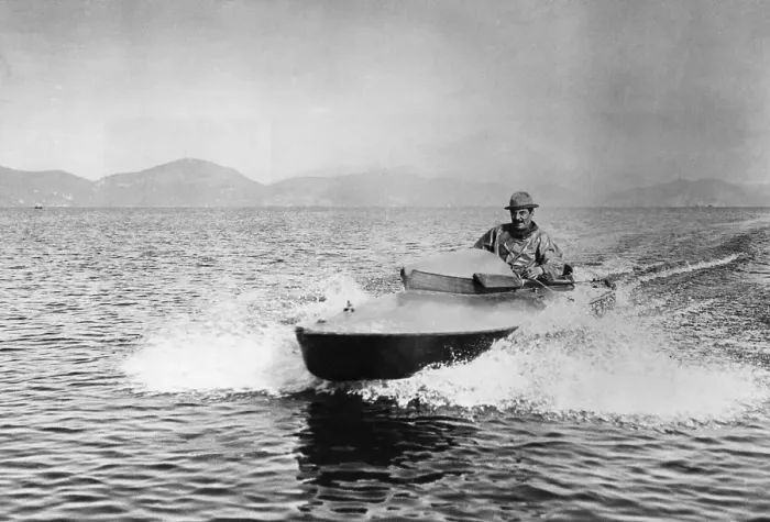 Framed Print : Puccini Piloting Motorboat Framed Print : Puccini Piloting Motorboat