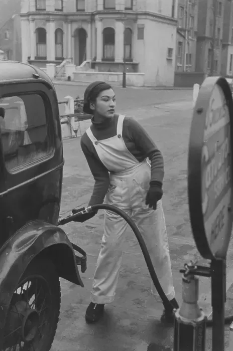 Framed Print : Pump Girl. 1st November 1952: A female pump attendant or petrol popsy at Framed Print : Pump Girl. 1st November 1952: A female pump attendant or petrol popsy at