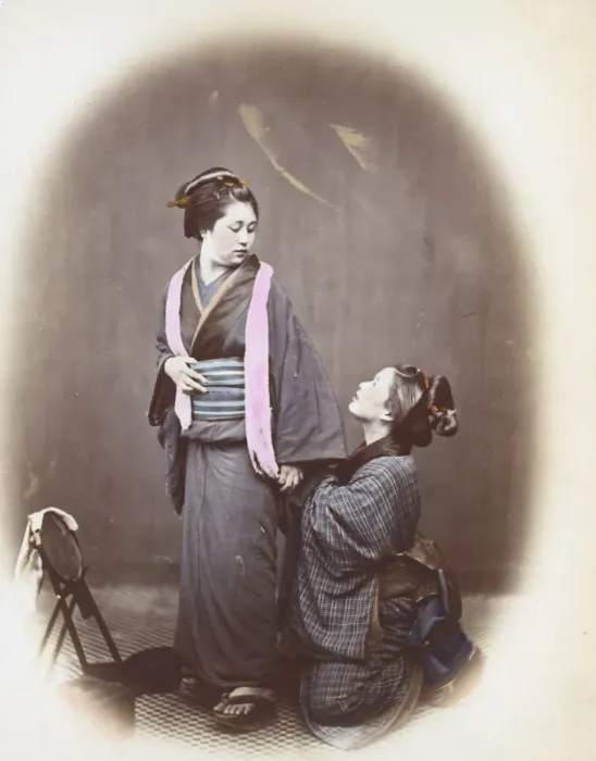 Framed Print : Putting On The Obi