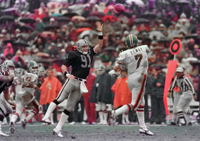 Framed Print : QB John Elway during Raiders vs. Broncos Game Framed Print : QB John Elway during Raiders vs. Broncos Game