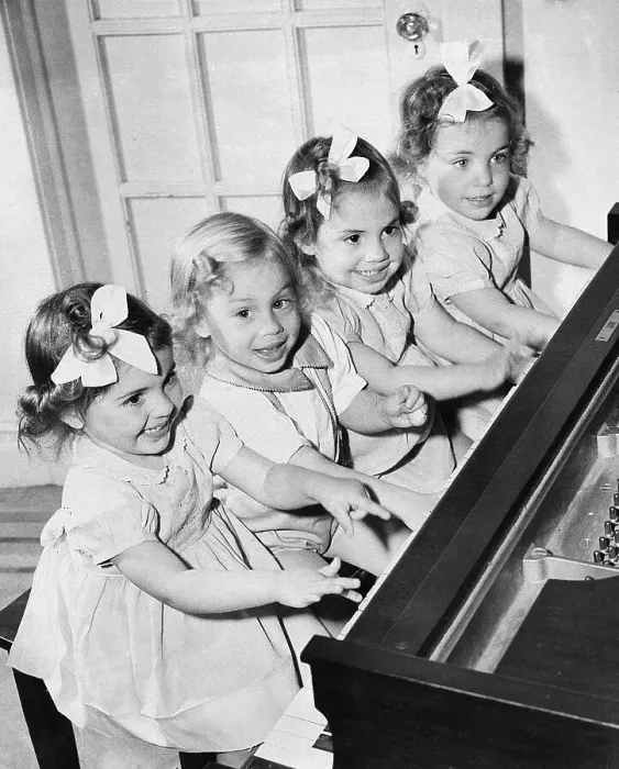 Framed Print : Quadruplets Playing Piano Framed Print : Quadruplets Playing Piano
