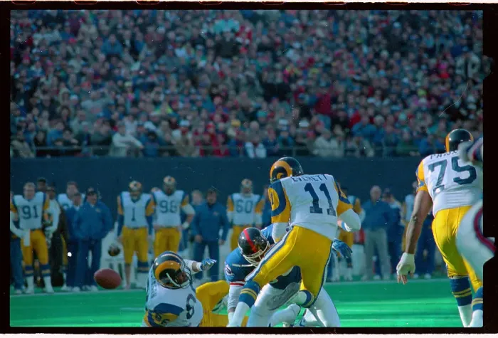 Framed Print : quarter Back Jim Everett is Being Sacked Framed Print : quarter Back Jim Everett is Being Sacked