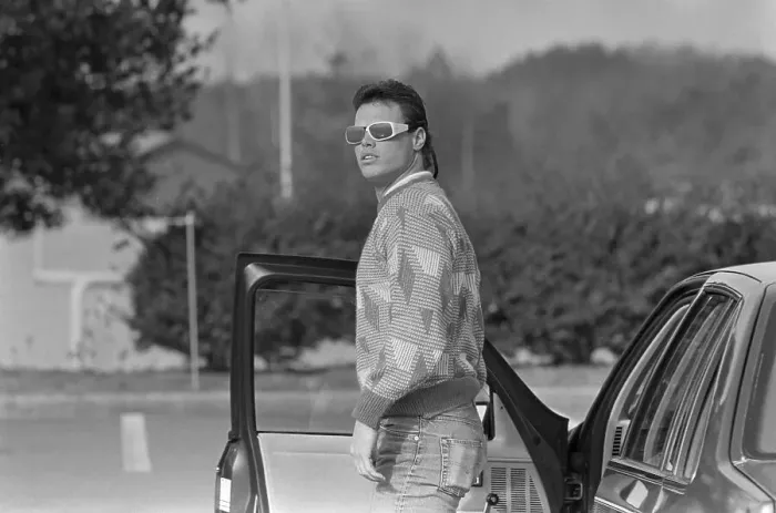 Framed Print : Quarterback Jim McMahon Standing Next to Car Framed Print : Quarterback Jim McMahon Standing Next to Car