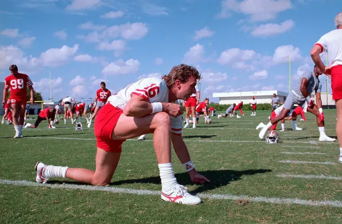 Framed Print : Quarterback Joe Montana Stretching Framed Print : Quarterback Joe Montana Stretching