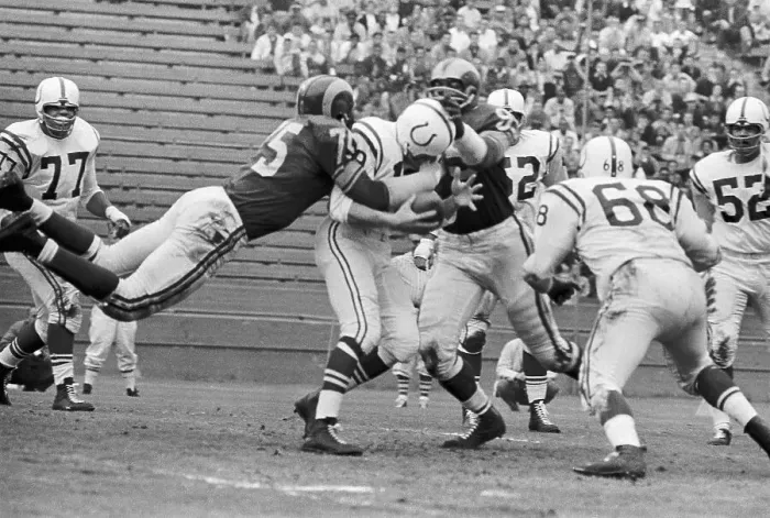 Framed Print : Quarterback Johnny Unitas Runs Through the Rams Defense Framed Print : Quarterback Johnny Unitas Runs Through the Rams Defense