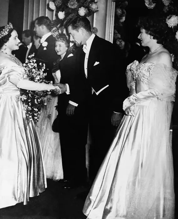Framed Print : Queen Elizabeth and Errol Flynn Shaking Hands Framed Print : Queen Elizabeth and Errol Flynn Shaking Hands