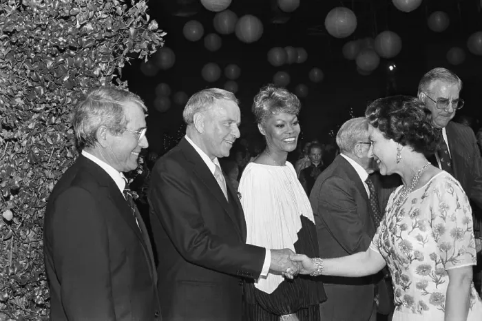 Framed Print : Queen Elizabeth II Shaking Hands with Frank Sinatra Framed Print : Queen Elizabeth II Shaking Hands with Frank Sinatra