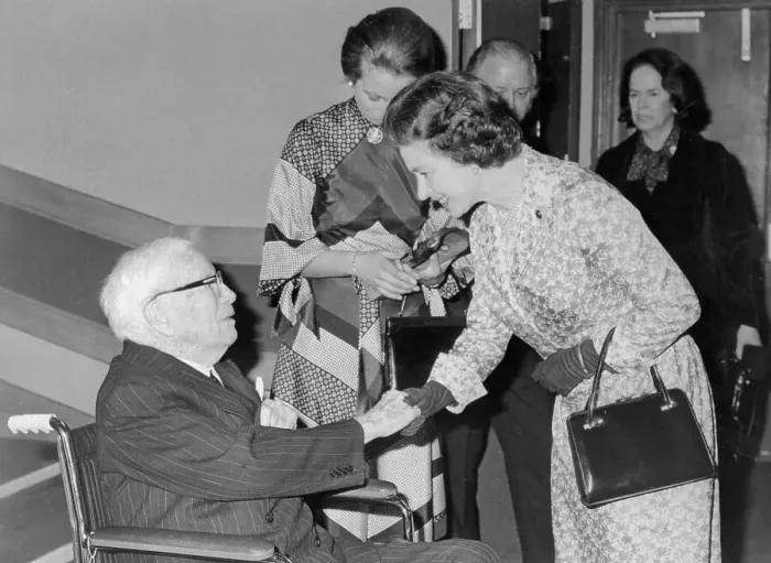 Framed Print : Queen Elizabeth Shaking Hands with Charlie Chaplin Framed Print : Queen Elizabeth Shaking Hands with Charlie Chaplin