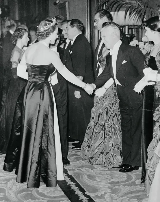 Framed Print : Queen Elizabeth Shaking Hands with Charlie Chaplin Framed Print : Queen Elizabeth Shaking Hands with Charlie Chaplin