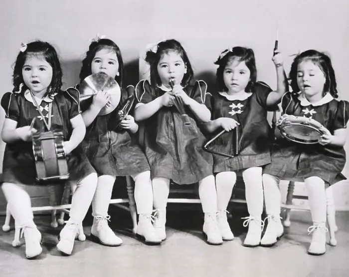 Framed Print : The Quintuplets Playing with Instruments