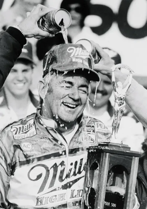 Framed Print : Race Car Driver Bobby Allison Holding Large Trophy Framed Print : Race Car Driver Bobby Allison Holding Large Trophy