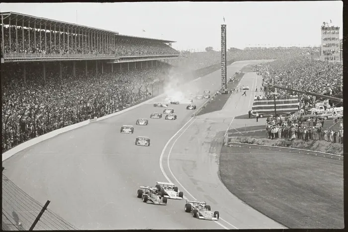 Framed Print : Race Cars Spinning out of Control