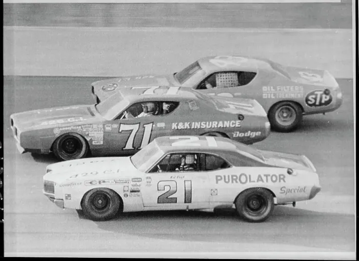 Framed Print : Three Race Fighting for Lead