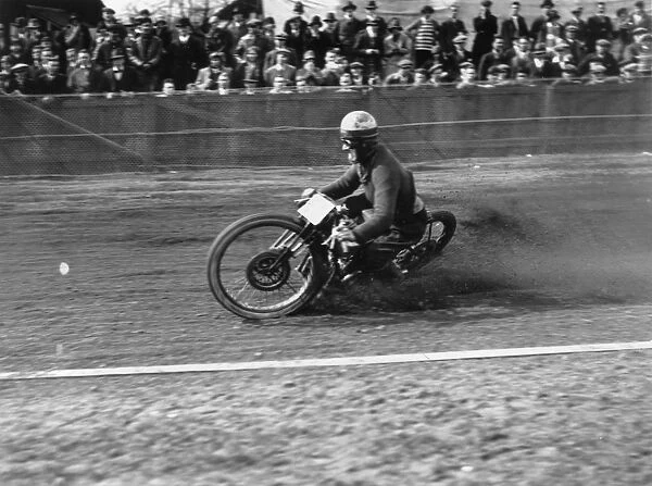 Race Skid. April 1928: Motor cycle racing on a dirt track at high beach, Loughton