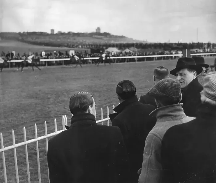 Framed Print : Racegoers. circa 1930: Jockeys E C Elliott and W Rae Johnstone watch racing at Lincoln Framed Print : Racegoers. circa 1930: Jockeys E C Elliott and W Rae Johnstone watch racing at Lincoln
