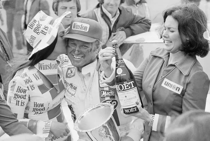 Framed Print : Racer Gale Yarborough With Trophy and Memorabilia Framed Print : Racer Gale Yarborough With Trophy and Memorabilia