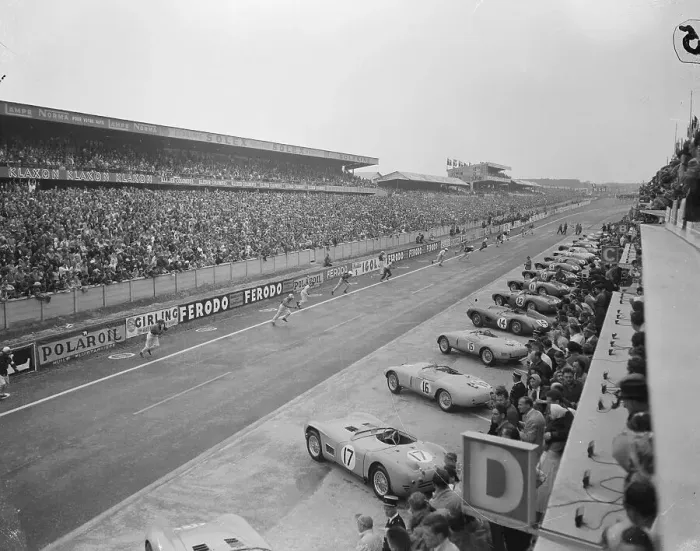 Framed Print : Racers Running for Parked Race Cars Framed Print : Racers Running for Parked Race Cars