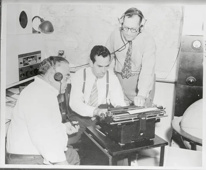 Framed Print : Radio Broadcasters Working on Script at Typewriter Framed Print : Radio Broadcasters Working on Script at Typewriter