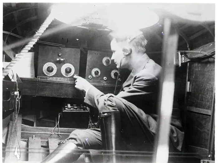 Framed Print : Radio Operator Turning Radio Up Framed Print : Radio Operator Turning Radio Up