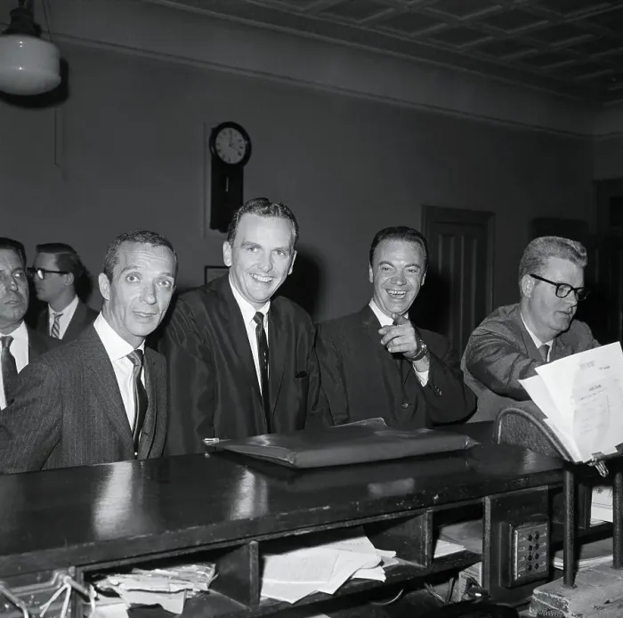 Framed Print : Radio Personalities Joking at Police Station Framed Print : Radio Personalities Joking at Police Station