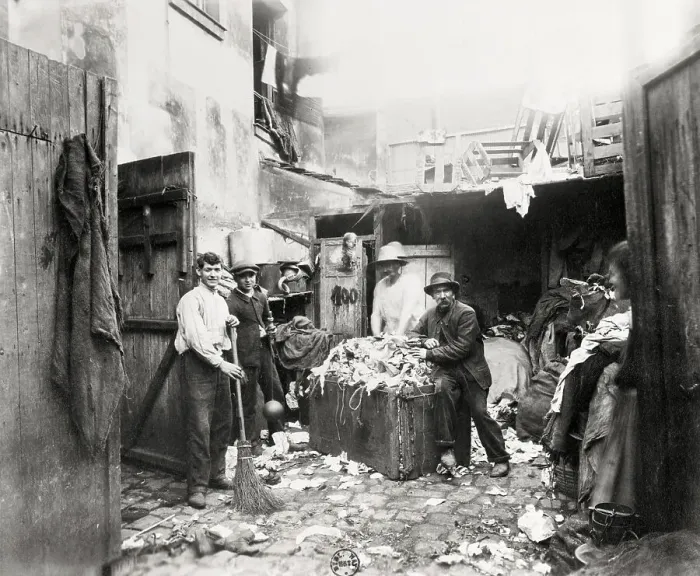 Framed Print : Rag Dealer Posing By Wares In Alley Framed Print : Rag Dealer Posing By Wares In Alley