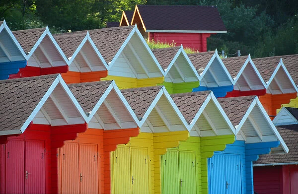 Rainbow-coloured beach-huts